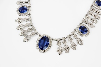 Lot 267 - A fancy 1950's silver, blue and white paste cluster set fringe necklace.