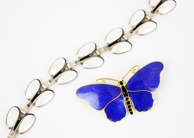 Lot 297 - A Sporrong & Co Stockholm enamel butterfly brooch and a silver and enamel Scandinavian bracelet.