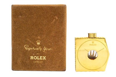 Lot 245 - A Rolex scent bottle, 'Perpetually Yours', Geneva.