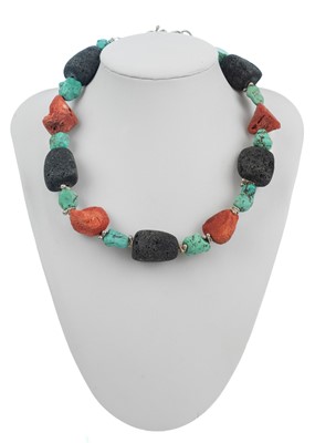Lot 77 - HELEN FEILER - A volcanic stone and turquoise bead silver necklace.