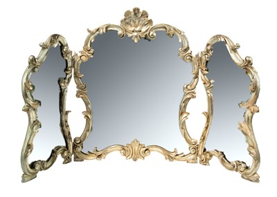 Lot 340 - A rococo style silvered triptych dressing table mirror.