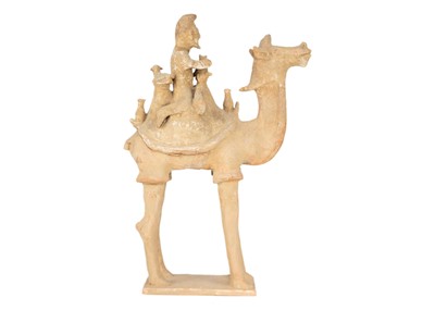 Lot 218 - A Chinese pottery model of a camel and rider, possibly Tang Dynasty.