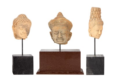 Lot 224 - Three Cambodian/Thai Buddhist pottery heads.