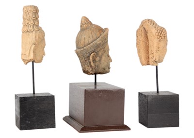 Lot 224 - Three Cambodian/Thai Buddhist pottery heads.