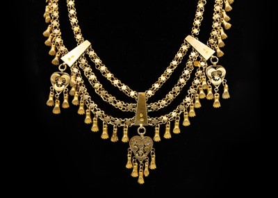 Lot 228 - An Egyptian gilt-metal festoon necklace.