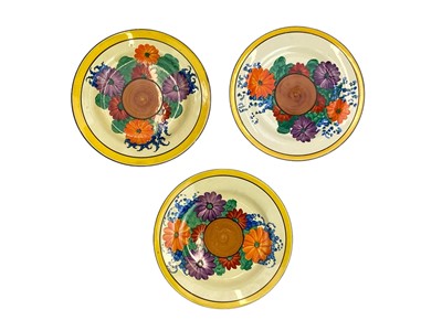 Lot 612 - Three Clarice Cliff Gay Day pattern side plates.