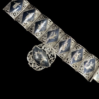 Lot 48 - A Thai silver Niello bracelet and brooch, 67g.