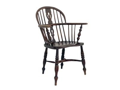 Lot 256 - An ash and elm Windsor armchair.