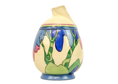 Lot 617 - A Clarice Cliff Rudyard pattern daffodil shape preserve pot and cover.