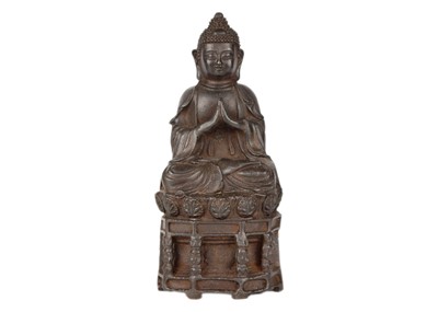 Lot 246 - A Chinese iron model of Buddha, 19th century.