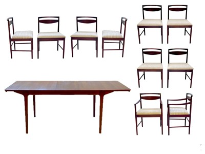 Lot 430 - A mid-century McIntosh teak extending dining table and ten chairs.