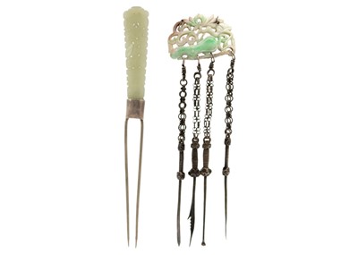 Lot 252 - A Chinese carved jade and white metal hairpin, early 20th century.