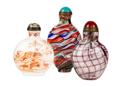 Lot 254 - Three Chinese glass snuff bottles.