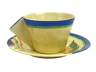 Lot 643 - A Clarice Cliff Ladore pattern Odilon shape cup and saucer.