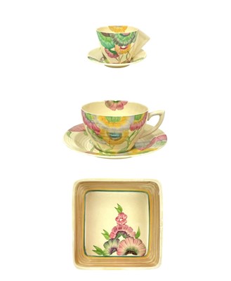 Lot 644 - A Clarice Cliff Pink Pearls pattern conical coffee can and saucer.