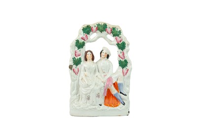 Lot 735 - A Victorian Staffordshire horse and foal spill vase.