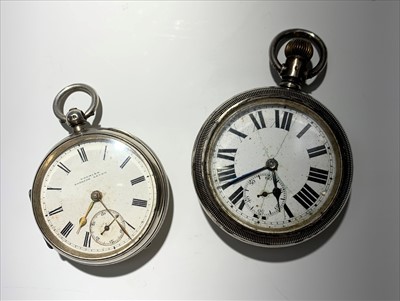 Lot 2404 - Two silver cased pocket watches, one with key...