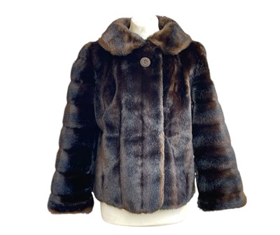 Lot 278 - A short faux fur jacket.