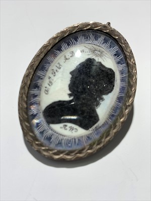 Lot 2414 - An 18th century mourning silhouette in silver...