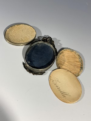Lot 2416 - An early 19th century verre eglomise portrait...