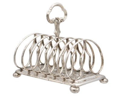 Lot 28 - An early Victorian silver six section toast rack by Edward & John Barnard.
