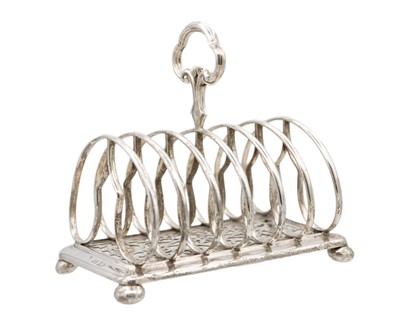 Lot 28 - An early Victorian silver six section toast rack by Edward & John Barnard.