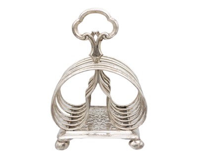 Lot 28 - An early Victorian silver six section toast rack by Edward & John Barnard.