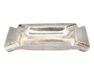 Lot 30 - A modern silver engine turned square ashtray and a silver meat skewer.