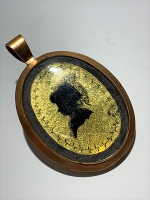 Lot 2417 - A double sided 18th century verre eglomise...