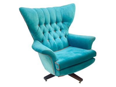 Lot 429 - A G-Plan Blofeld swivel armchair.