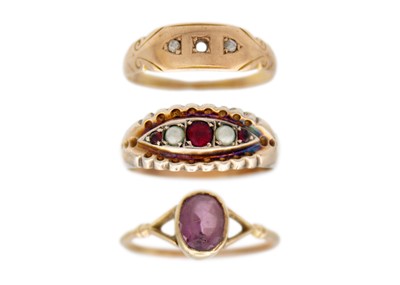 Lot 56 - A selection of three gem set gold rings.