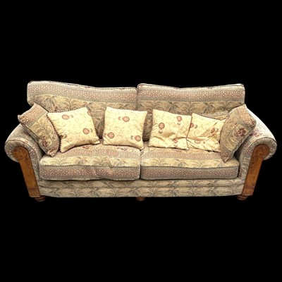 Lot 1 - A Three Seater Sofa. The Sofa measures 230cm...