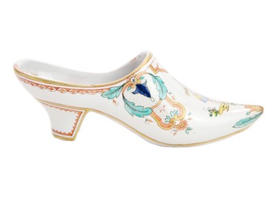 Lot 440 - A finely painted 19th century faïence marriage shoe.