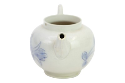 Lot 365 - A miniature saltglaze teapot.