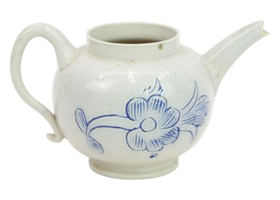 Lot 365 - A miniature saltglaze teapot.