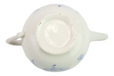 Lot 365 - A miniature saltglaze teapot.