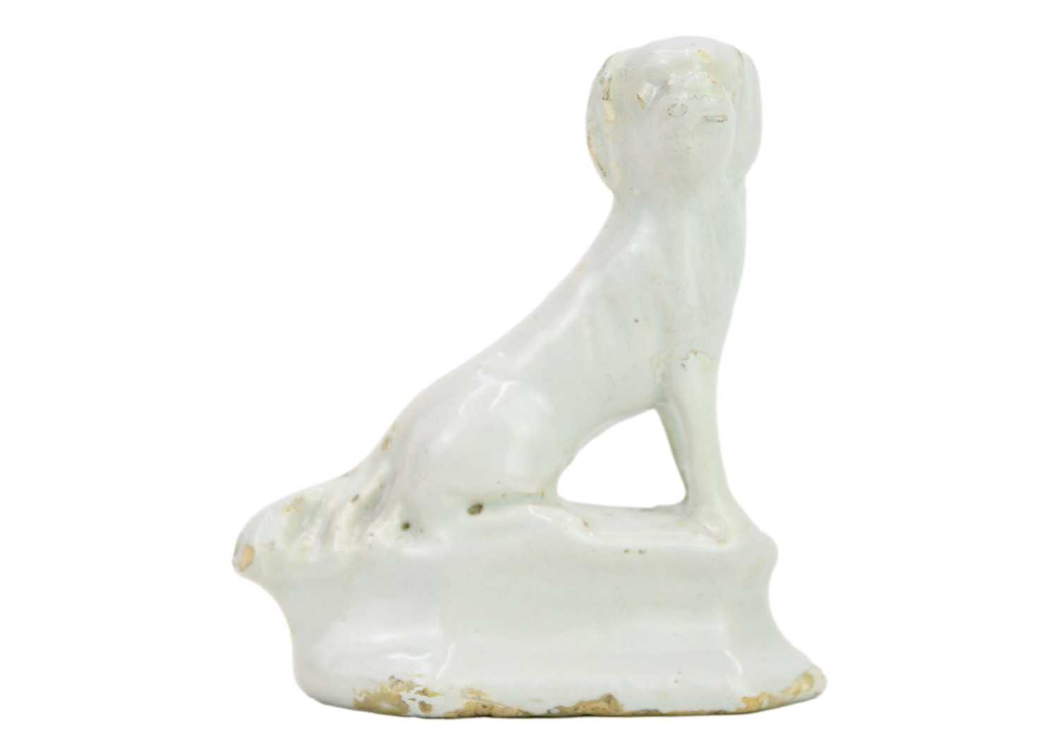 Lot 469 - A rare Delft figure of a hound.