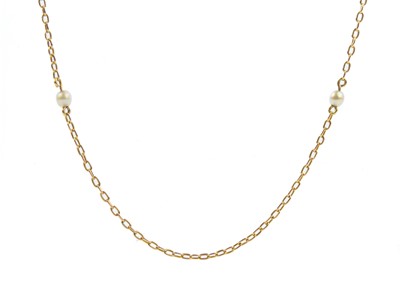 Lot 82 - A 9ct gold oval cable chain necklace with eight pearl spacers.