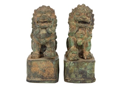 Lot 325 - A pair of Chinese metal on porcelain dogs of fo, early 20th century.