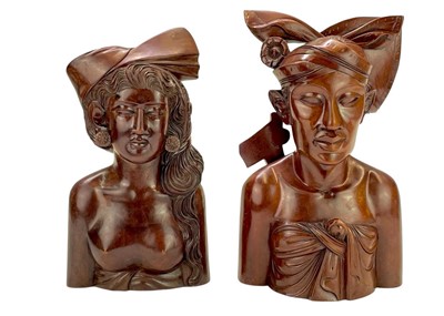 Lot 160 - A pair of Balinese hardwood carved busts.