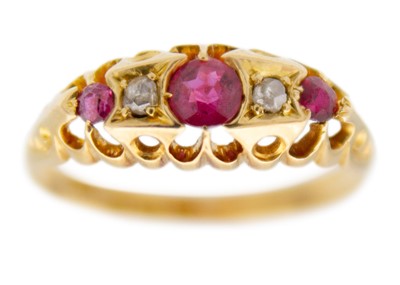 Lot 50 - A Victorian 18ct hallmarked gold diamond and ruby set five stone ring.