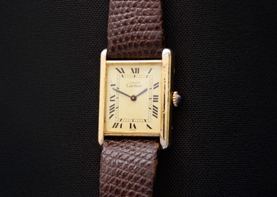 Lot 157 - MUST DE CARTIER - A tank-cased silver gilt gentleman's manual wind wristwatch.