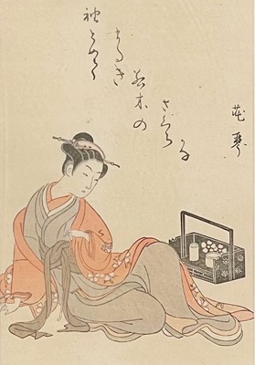 Lot 346 - A Japanese woodcut print of a seated courtesan.