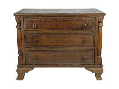 Lot 699 - A miniature mahogany and crossbanded chest.