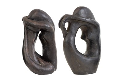 Lot 129 - Two modernist black painted terracotta sculptures.