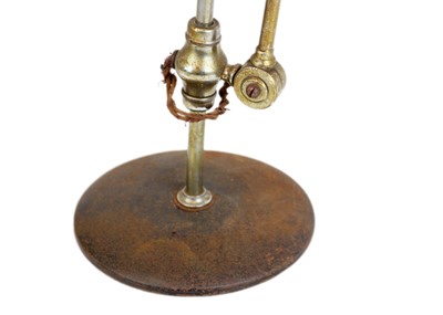 Lot 560 - A Supreme Adapt-O-Lite adjustable desk lamp.