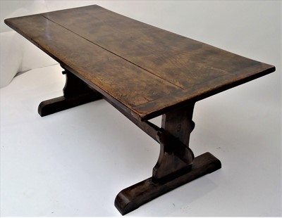 Lot 3502 - An elm refectory table, the rectangular top on...