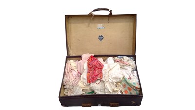 Lot 151 - Suitcase of dolls linens/clothes.