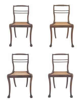 Lot 999 - A set of four Regency mahogany dining chairs.