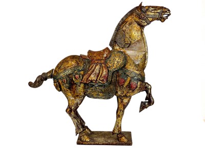 Lot 500 - A Chinese gilt wood figure of a horse.